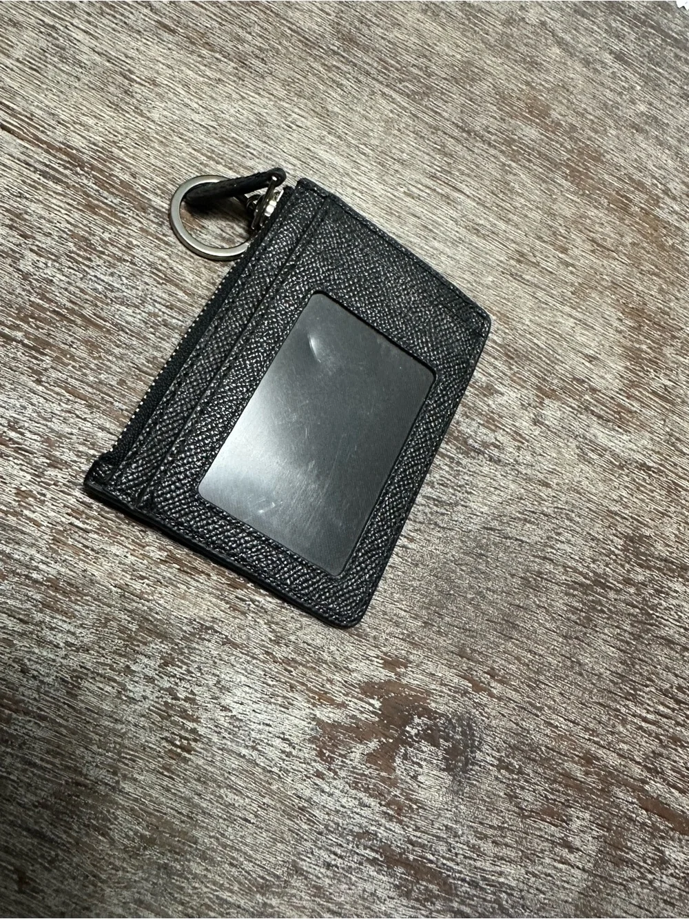 Coach slim zip